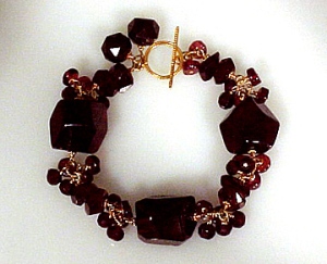 Bracelet: Garnets with 18K gold